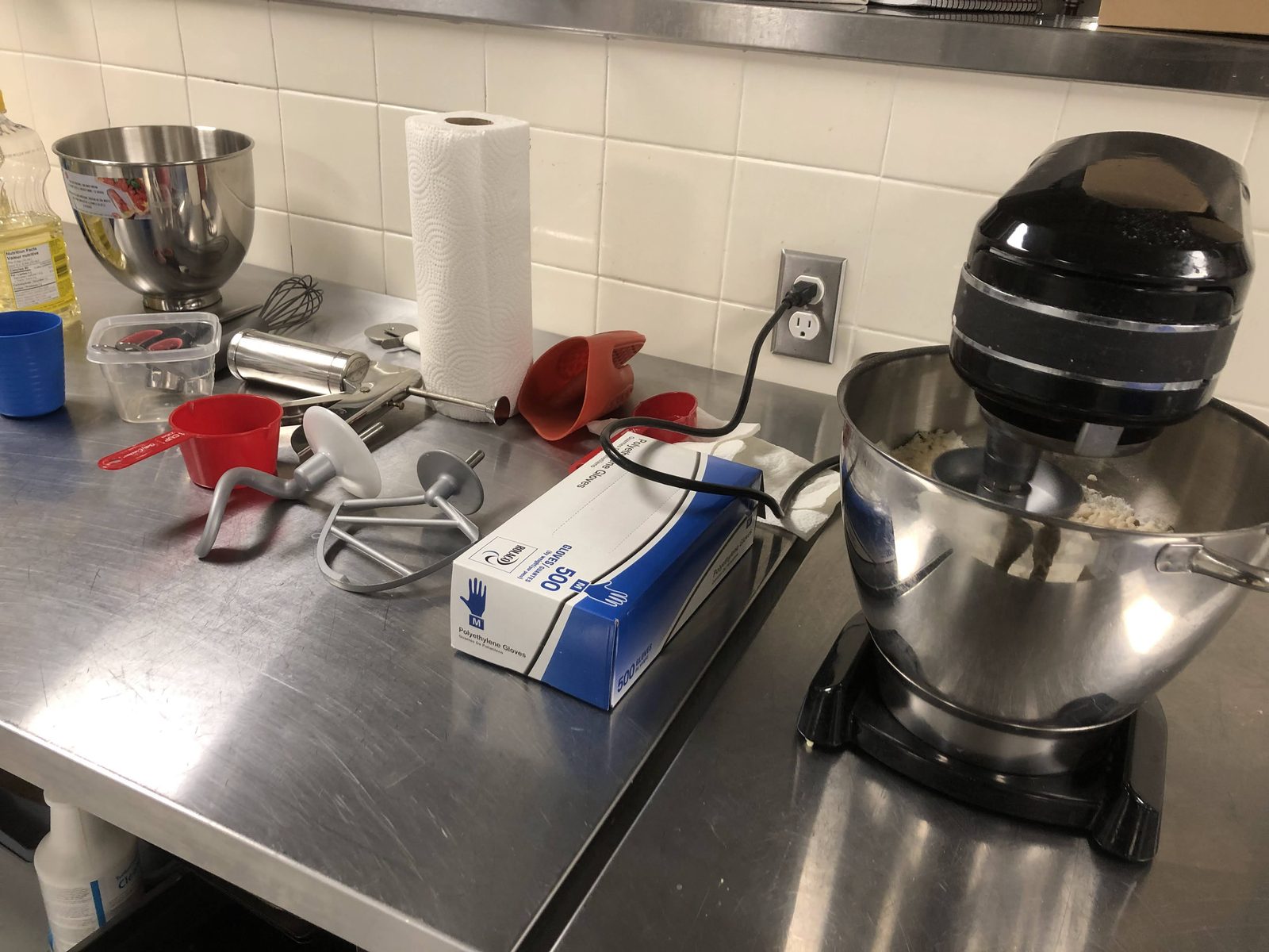 Dough being mixed in the Mrukku Bites commercial kitchen