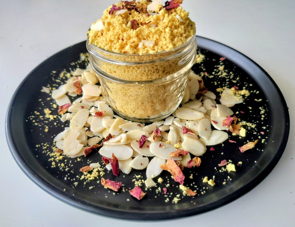 Mrukku Bites badam almond drink mix arranged on a plate with nuts