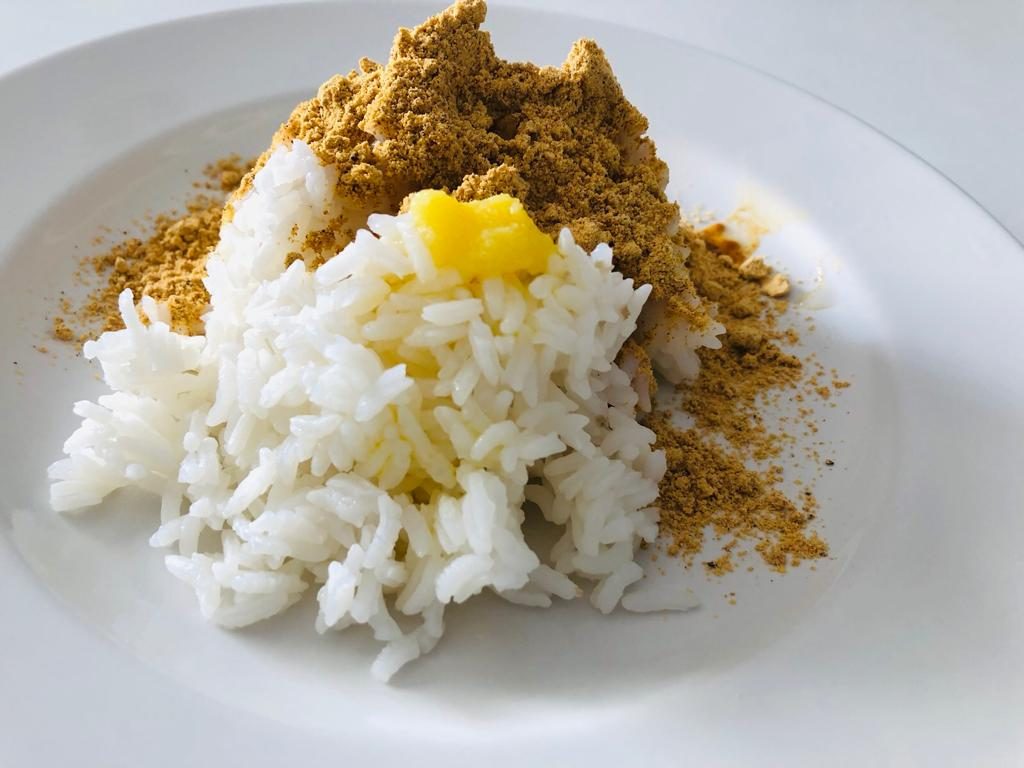 Spicy lentil powder stirred into hot rice with a pat of melting butter
